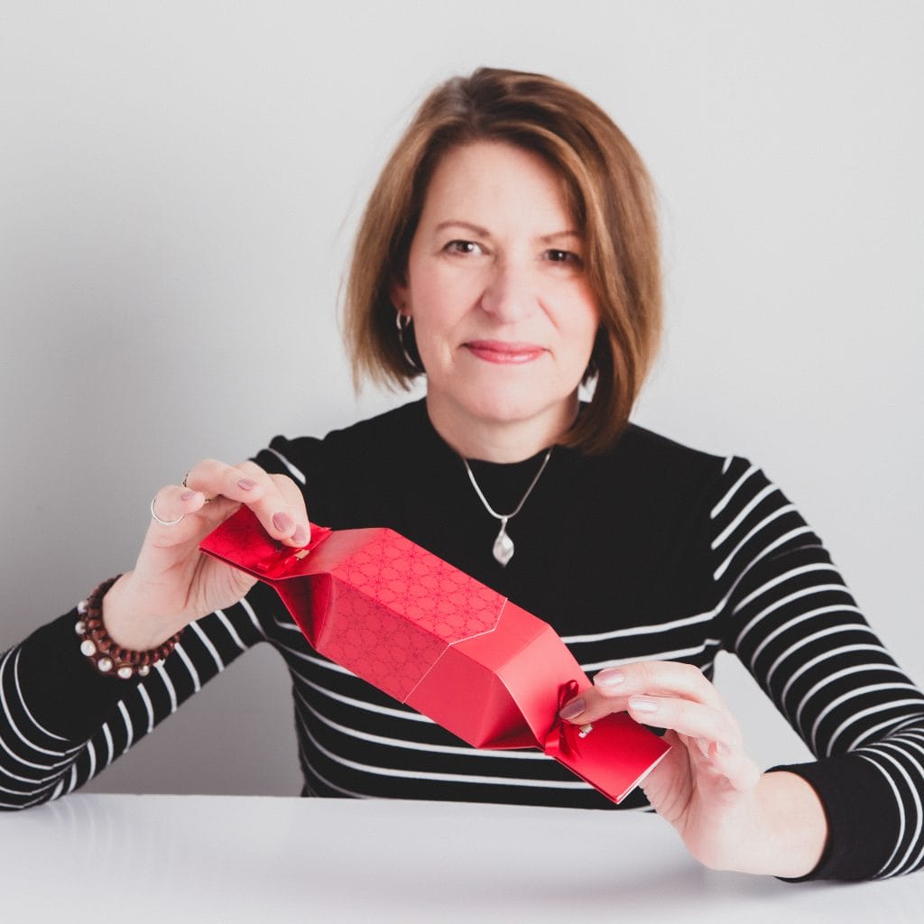 Bea Thackeray founder at Keep This Cracker holding a reusable cracker