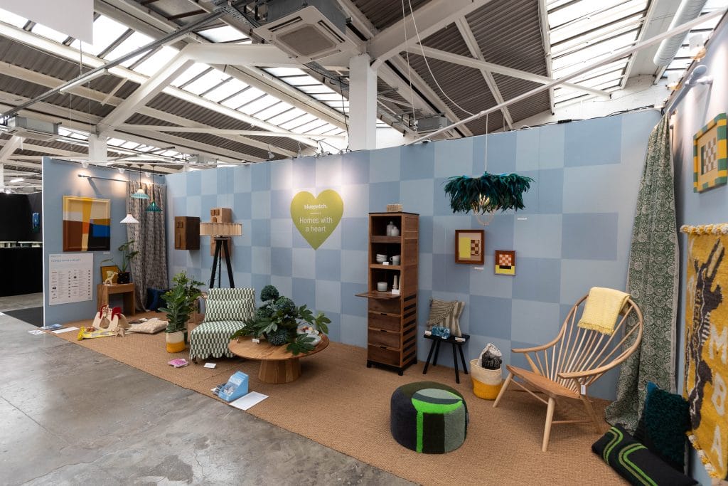 left hand view of Homes with a Heart at London Design Fair, showing all the brands at once.