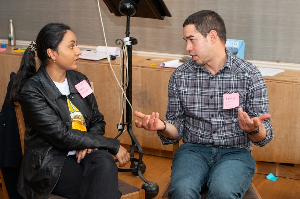 Blue Patch members chatting about net zero emissions at a carbon saving workshop